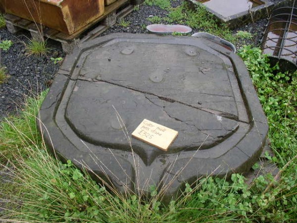 Square cider press stone base with protruding spout from the UK